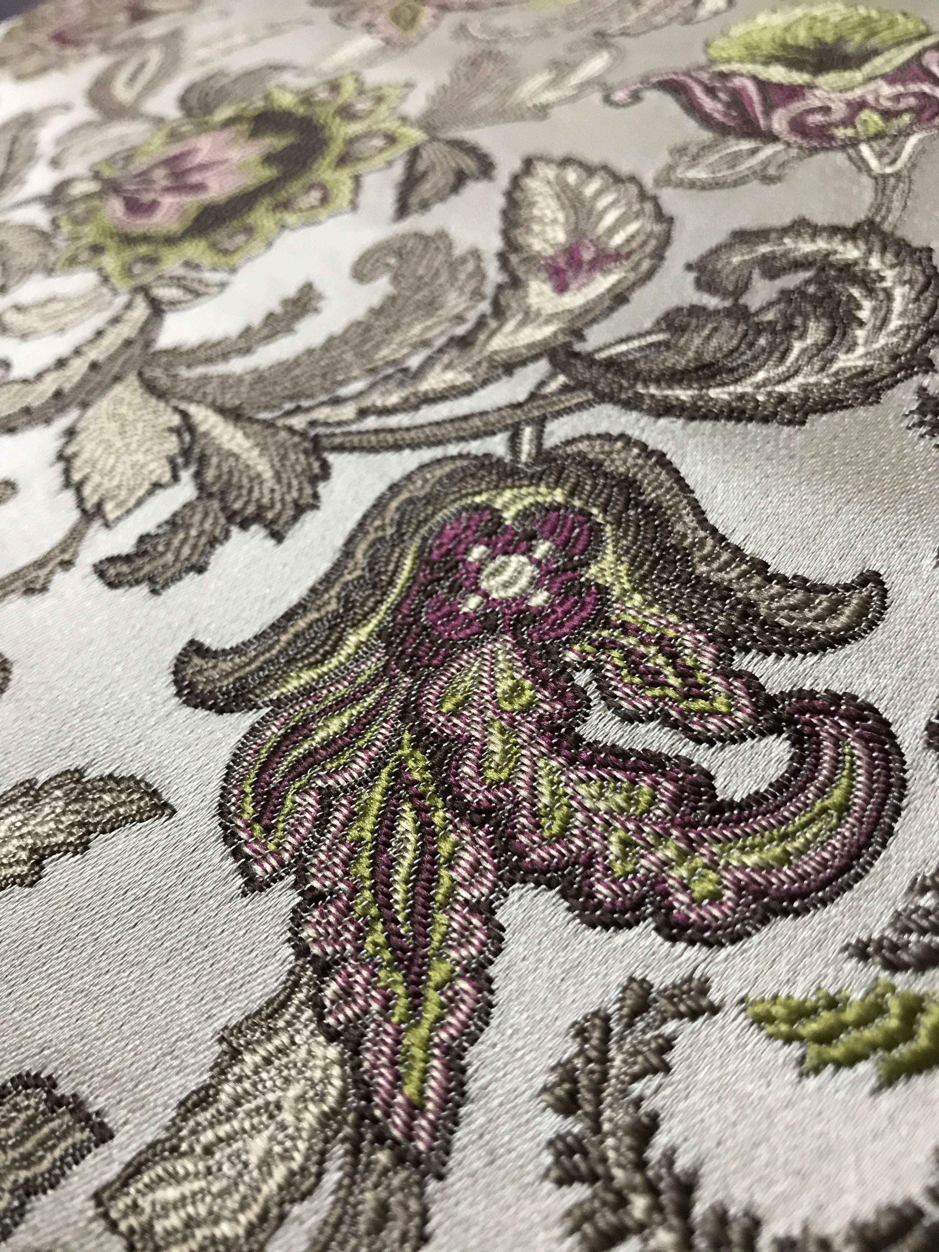 Close-up of embroidered floral pattern on fabric Heritage Sage