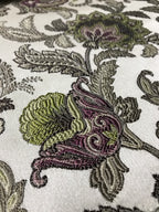 Close-up of embroidered floral pattern on fabric Heritage Sage