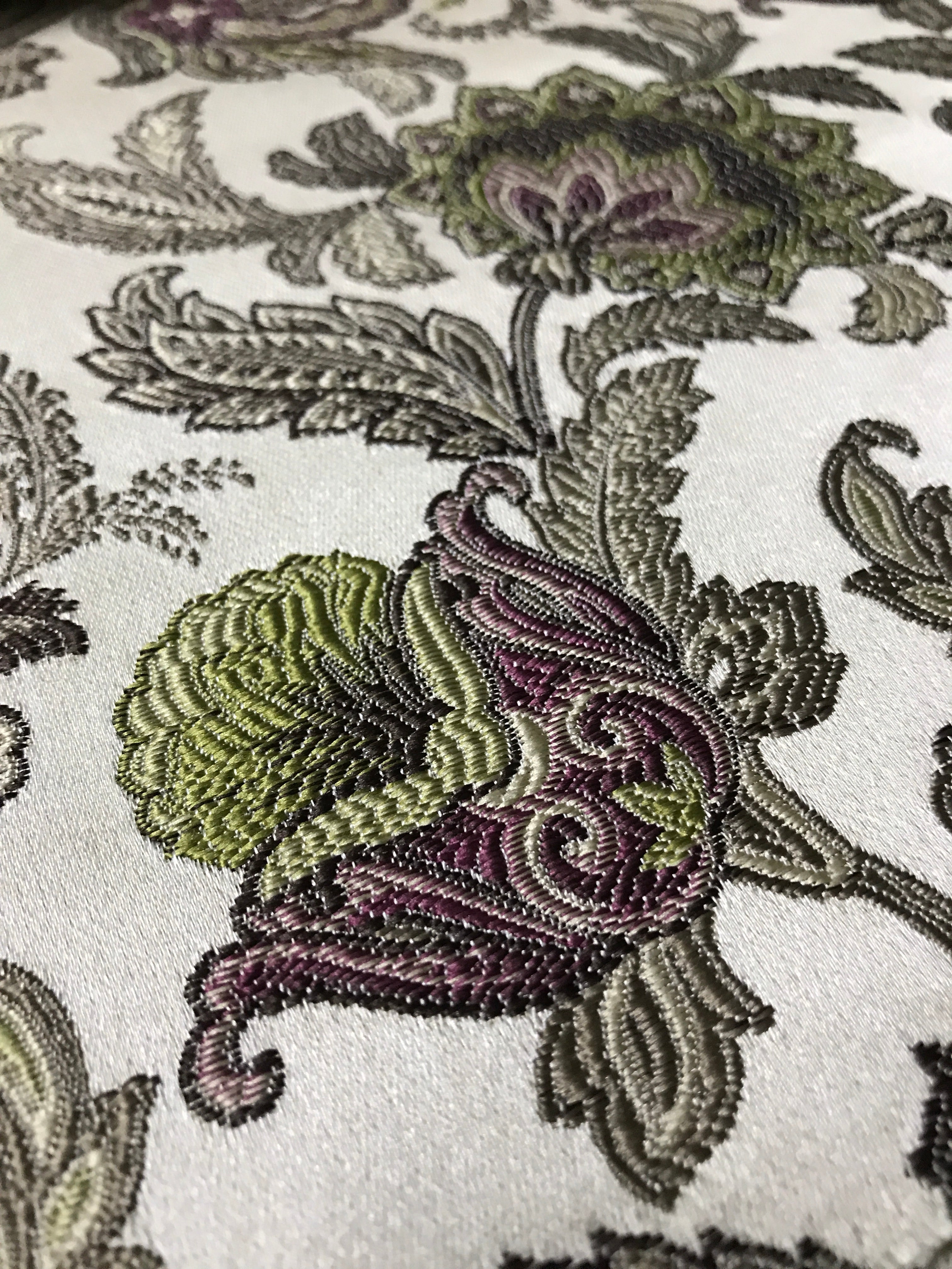 Close-up of embroidered floral pattern on fabric Heritage Sage