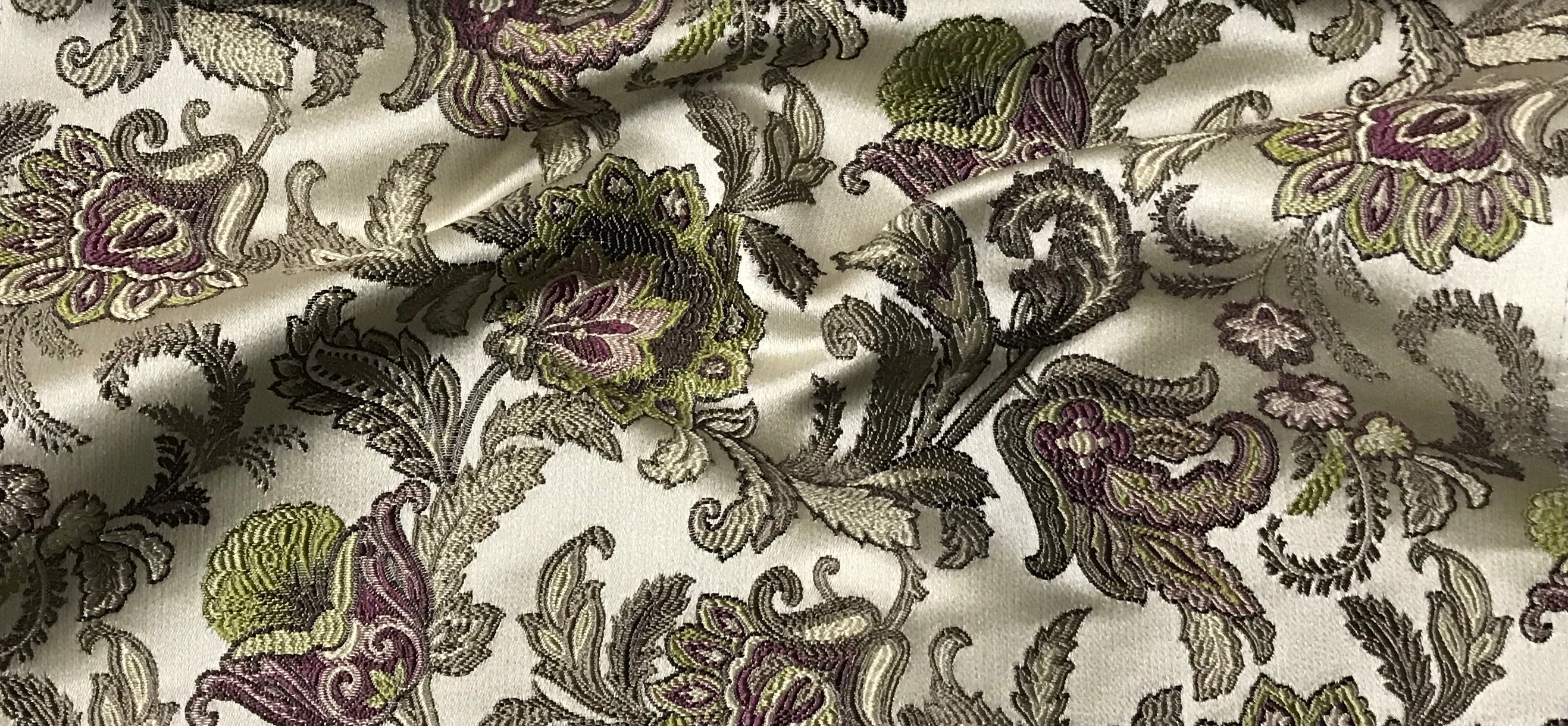 Patterned fabric with floral design on a beige background Heritage Sage