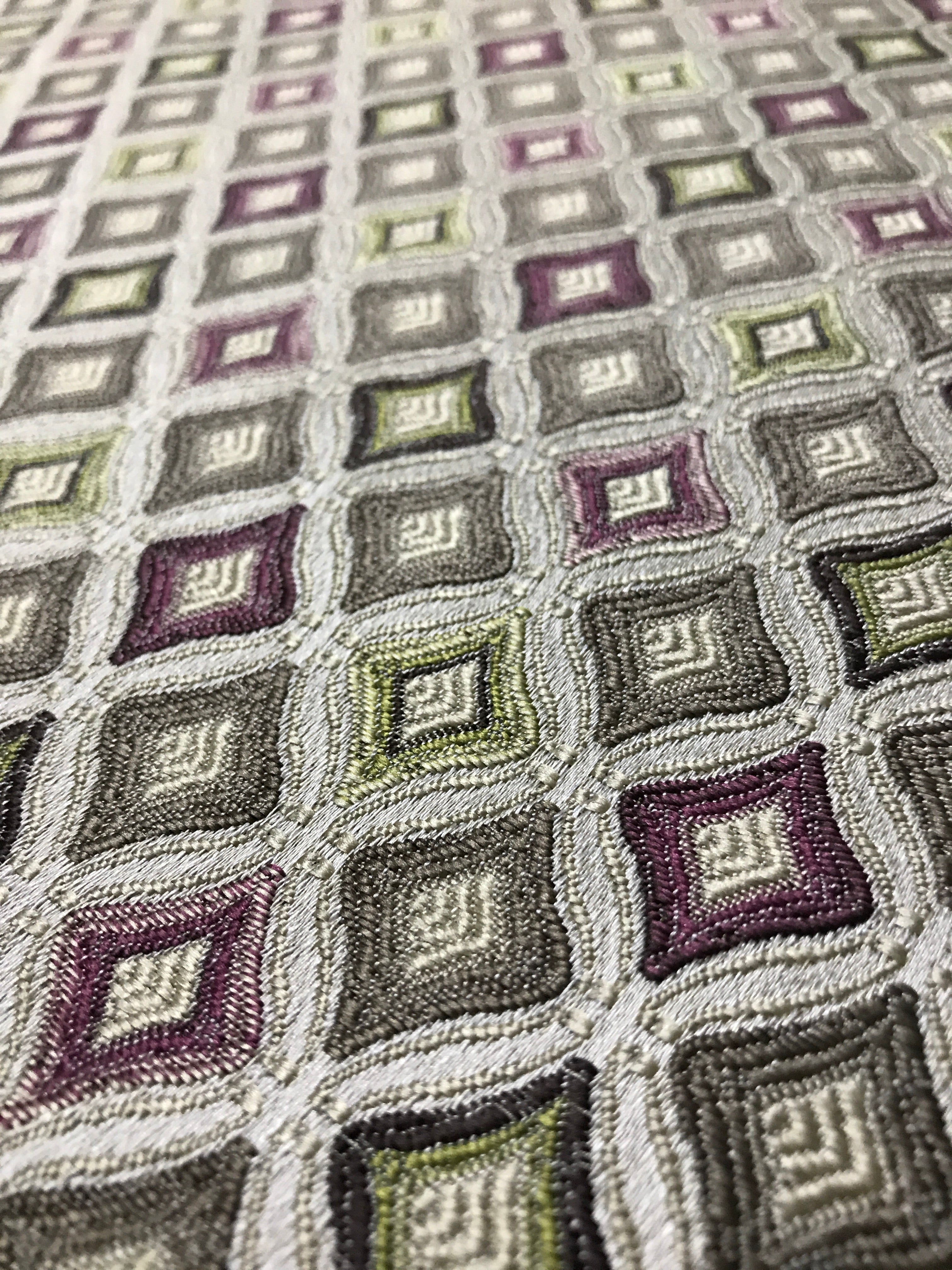 Close-up of a textured fabric with geometric pattern Heritage Sage