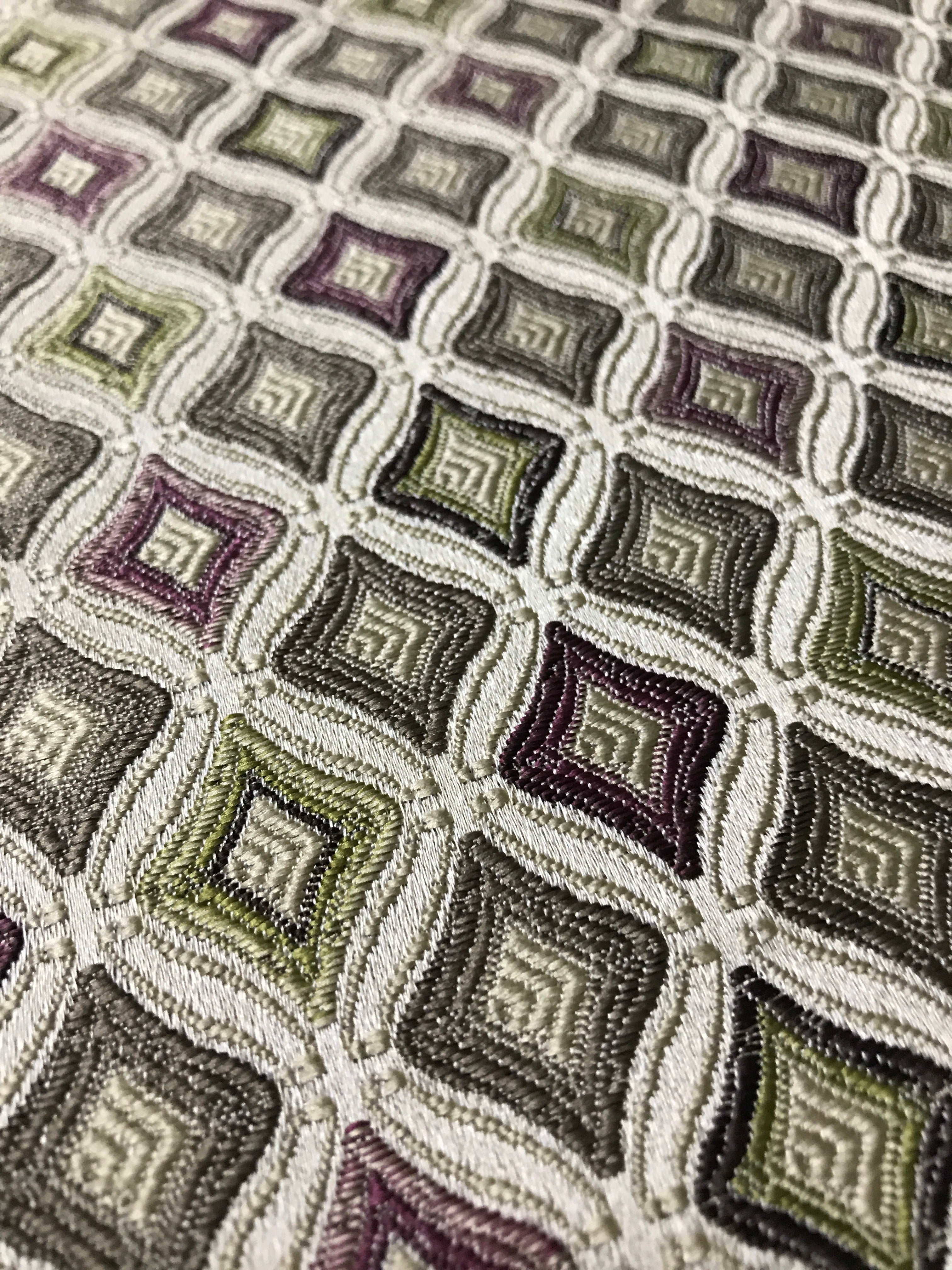 Close-up of a textured fabric with geometric pattern Heritage Sage