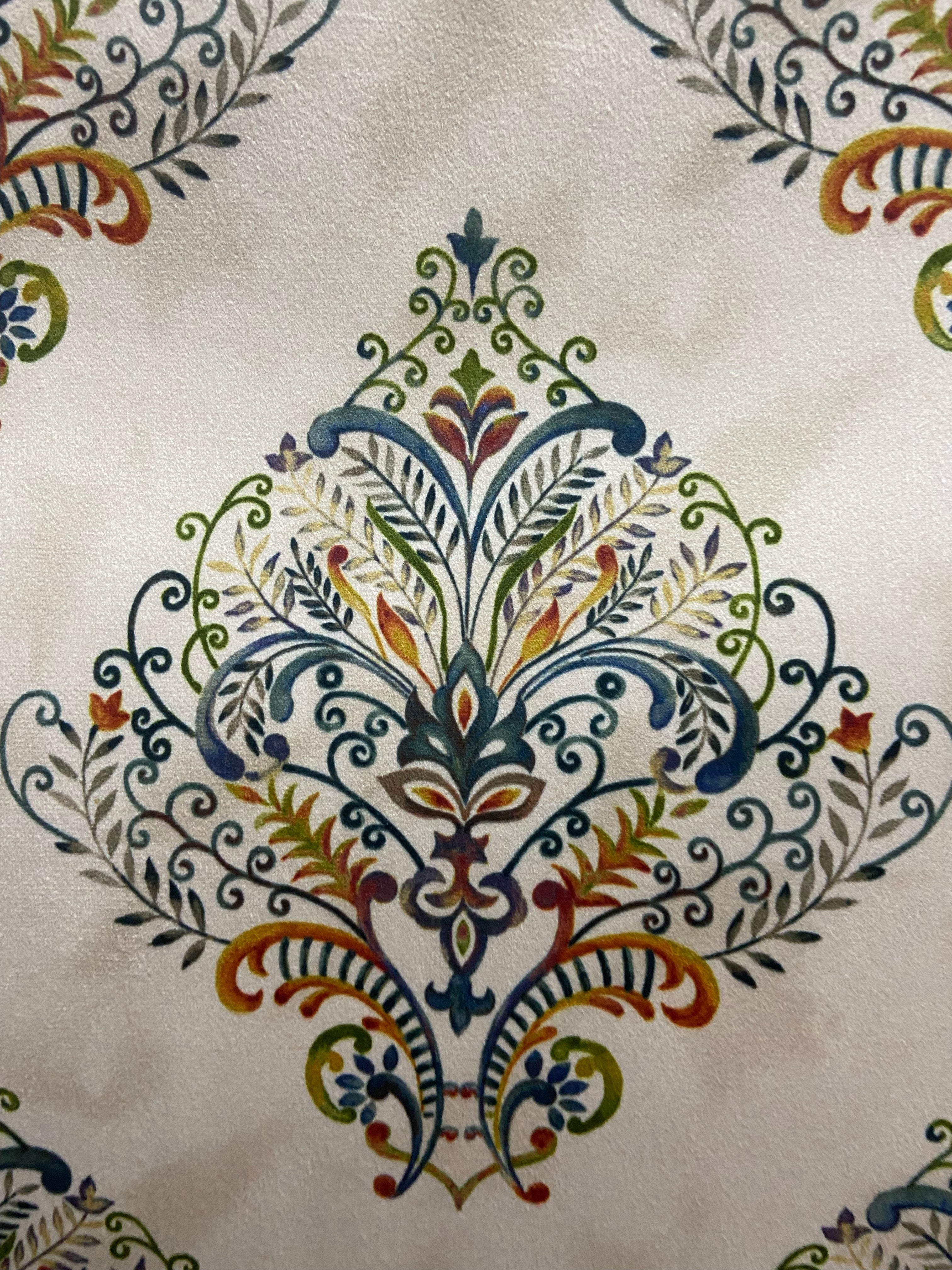 Decorative fabric pattern with Multicolor designs on a taupe background