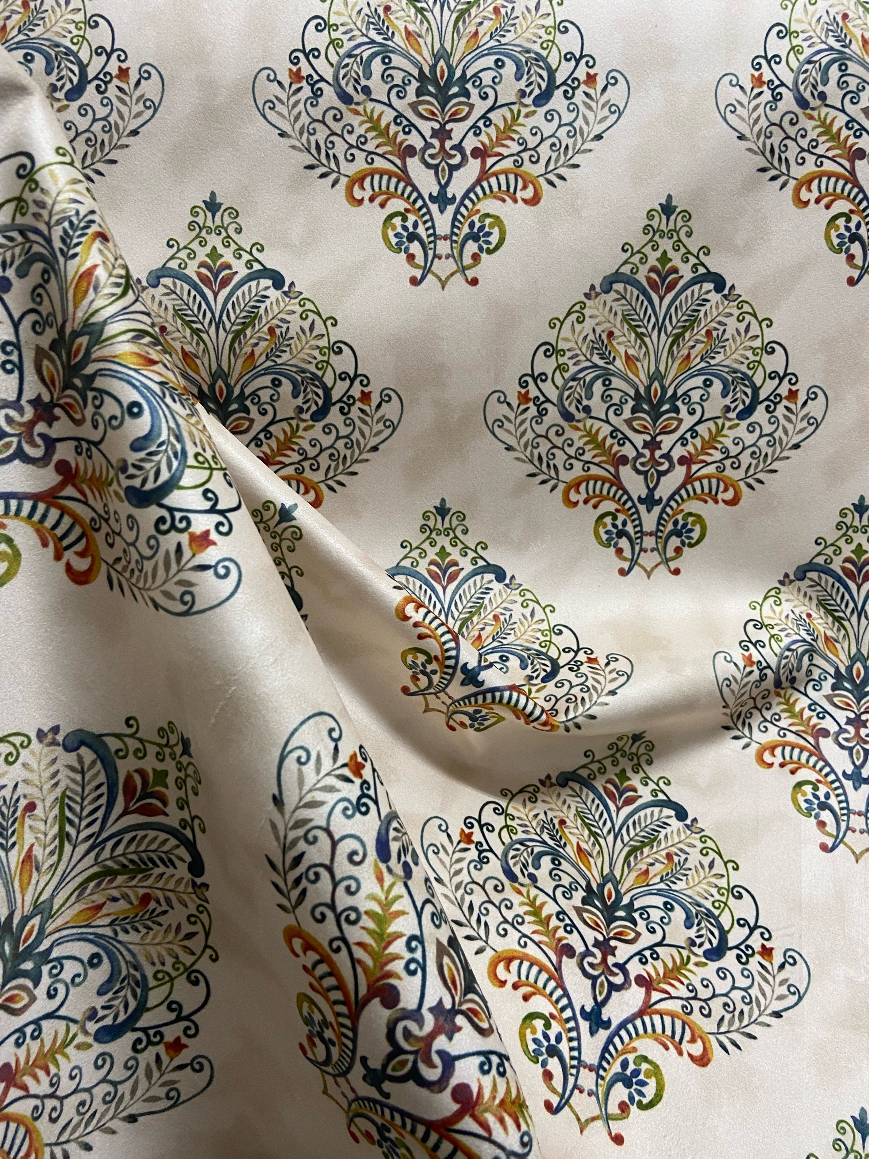 Decorative fabric pattern with Multicolor designs on a taupe background