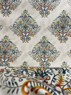 Decorative fabric pattern with Multicolor designs on a taupe background