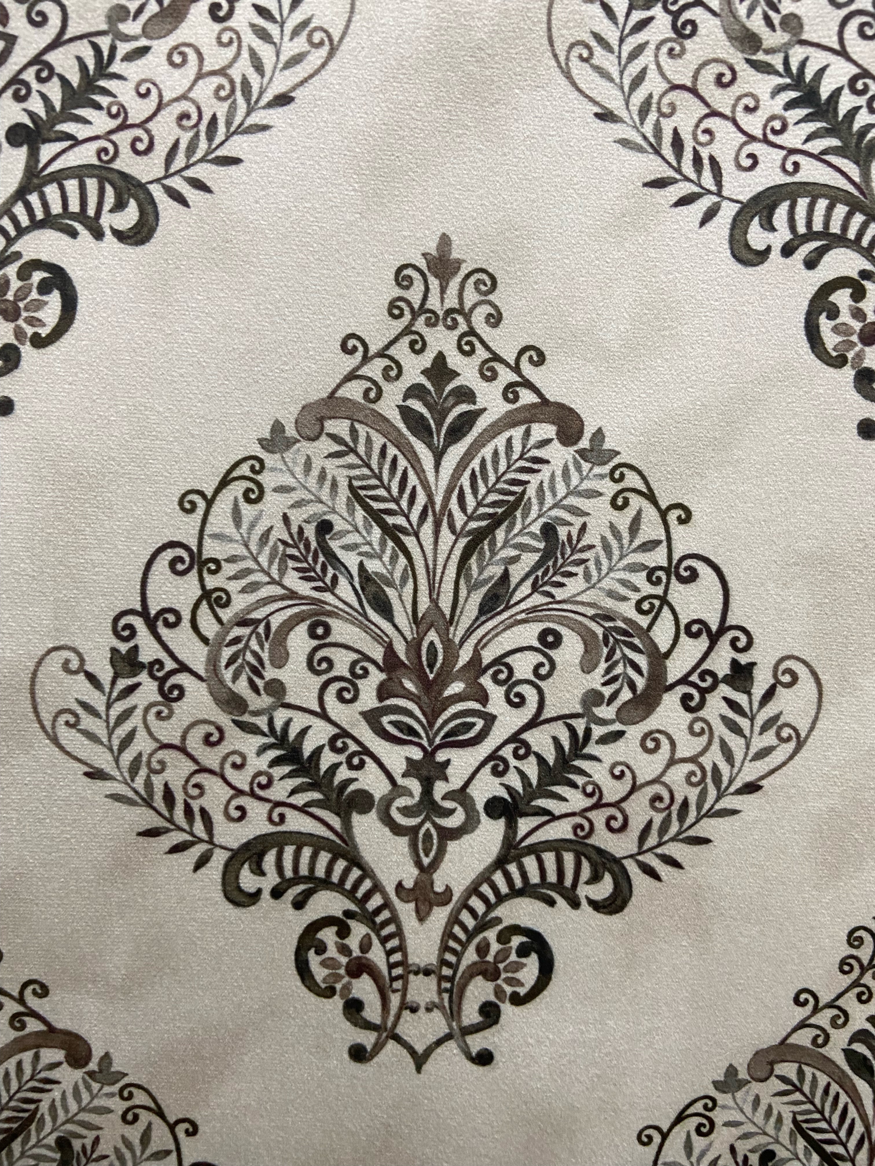 Decorative fabric pattern with Brown designs on a taupe background