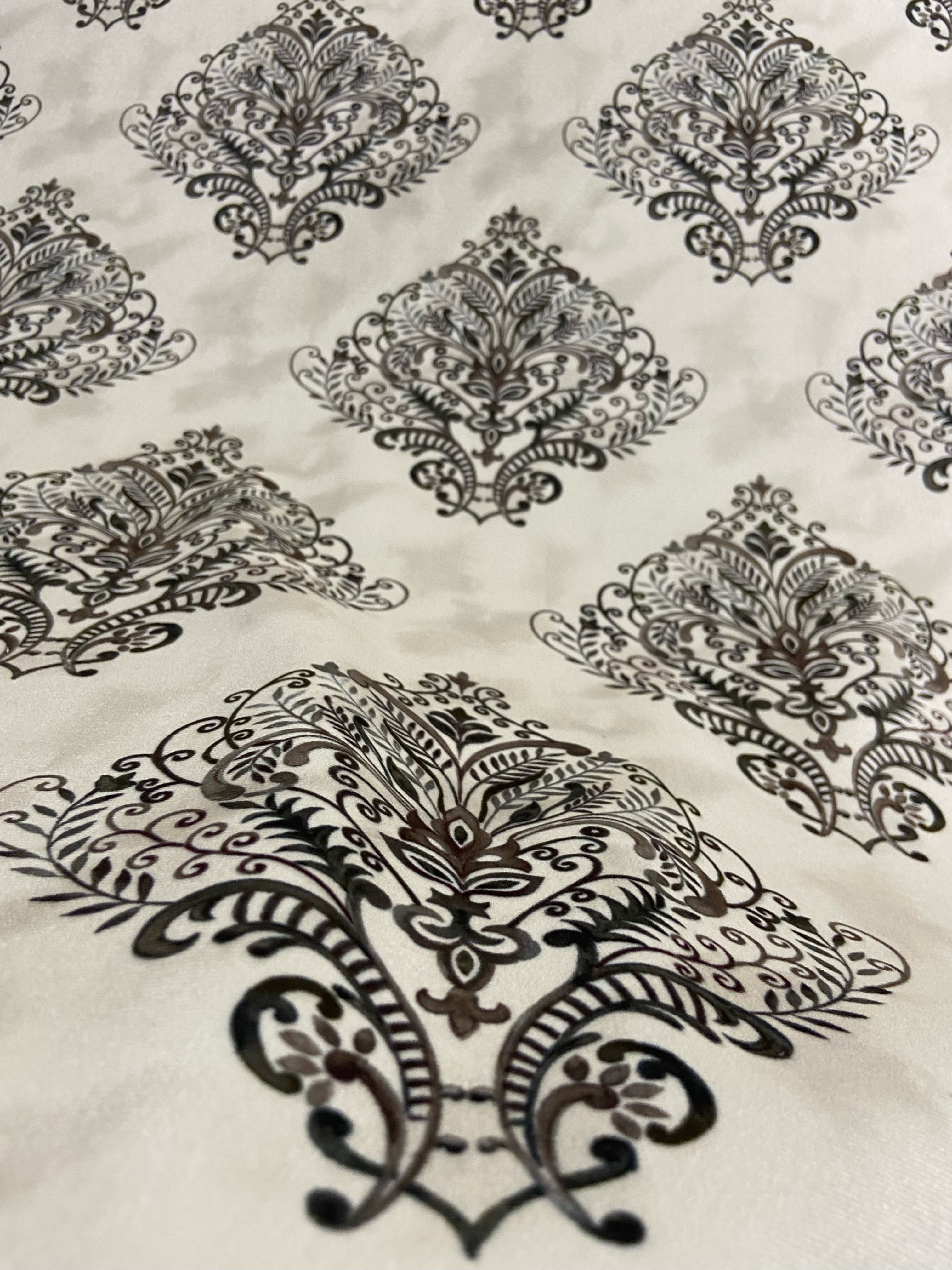 Decorative fabric pattern with Brown designs on a taupe background