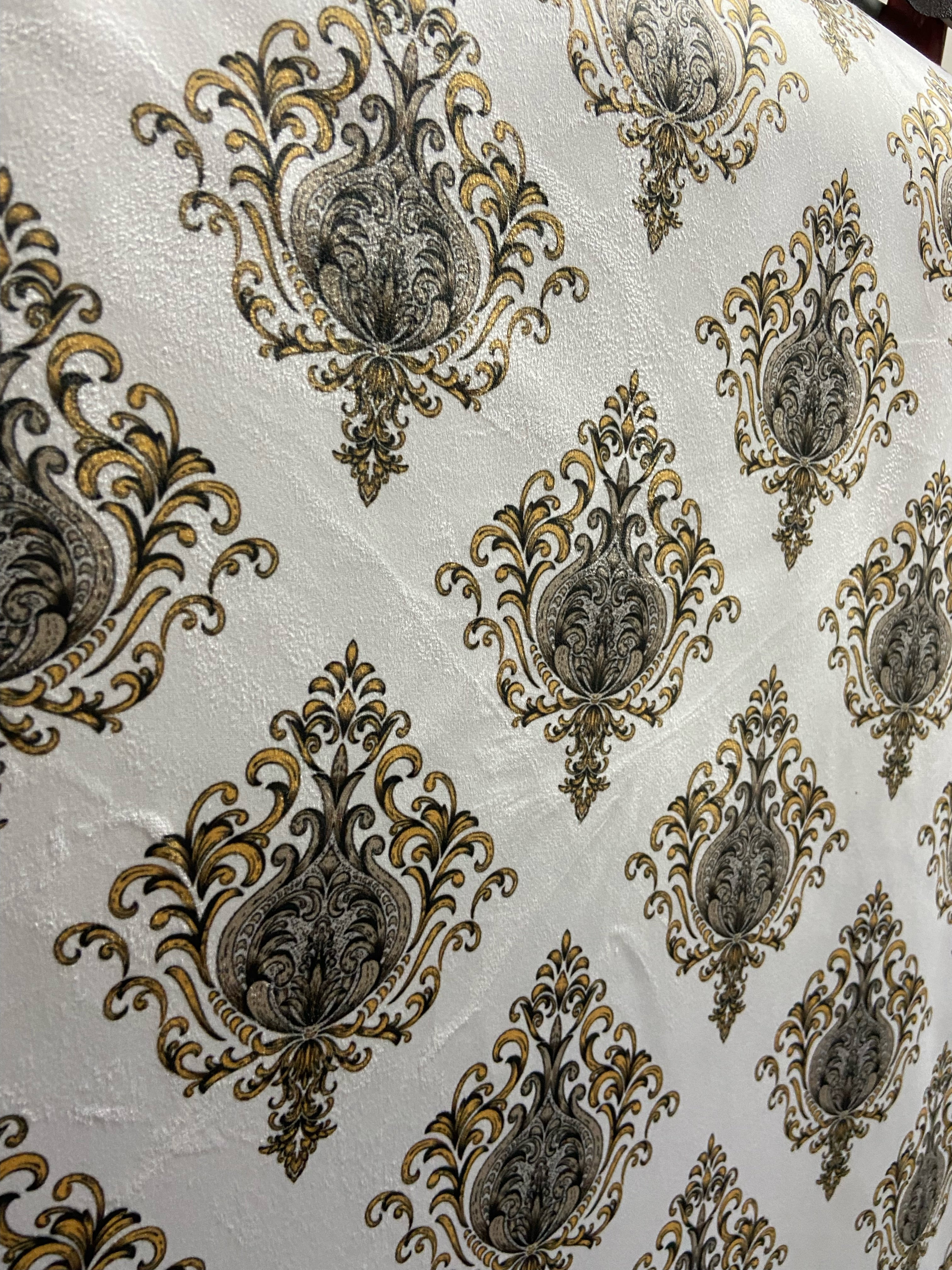 Decorative pattern of Gold medallions of taupe background