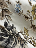 Floral pattern with Blue and brown flowers on a light background