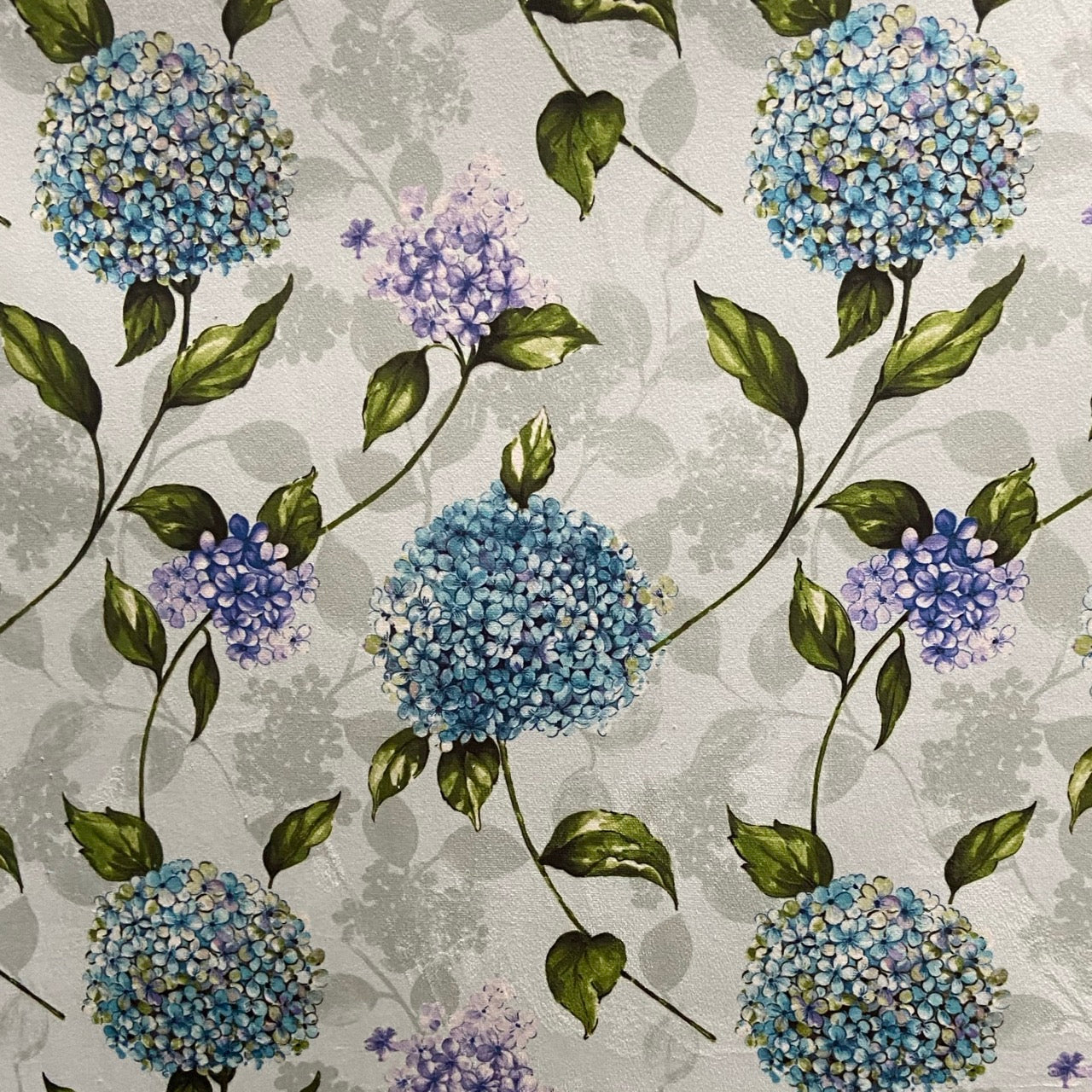 Pattern of Blue and purple Hydrangea on taupe background