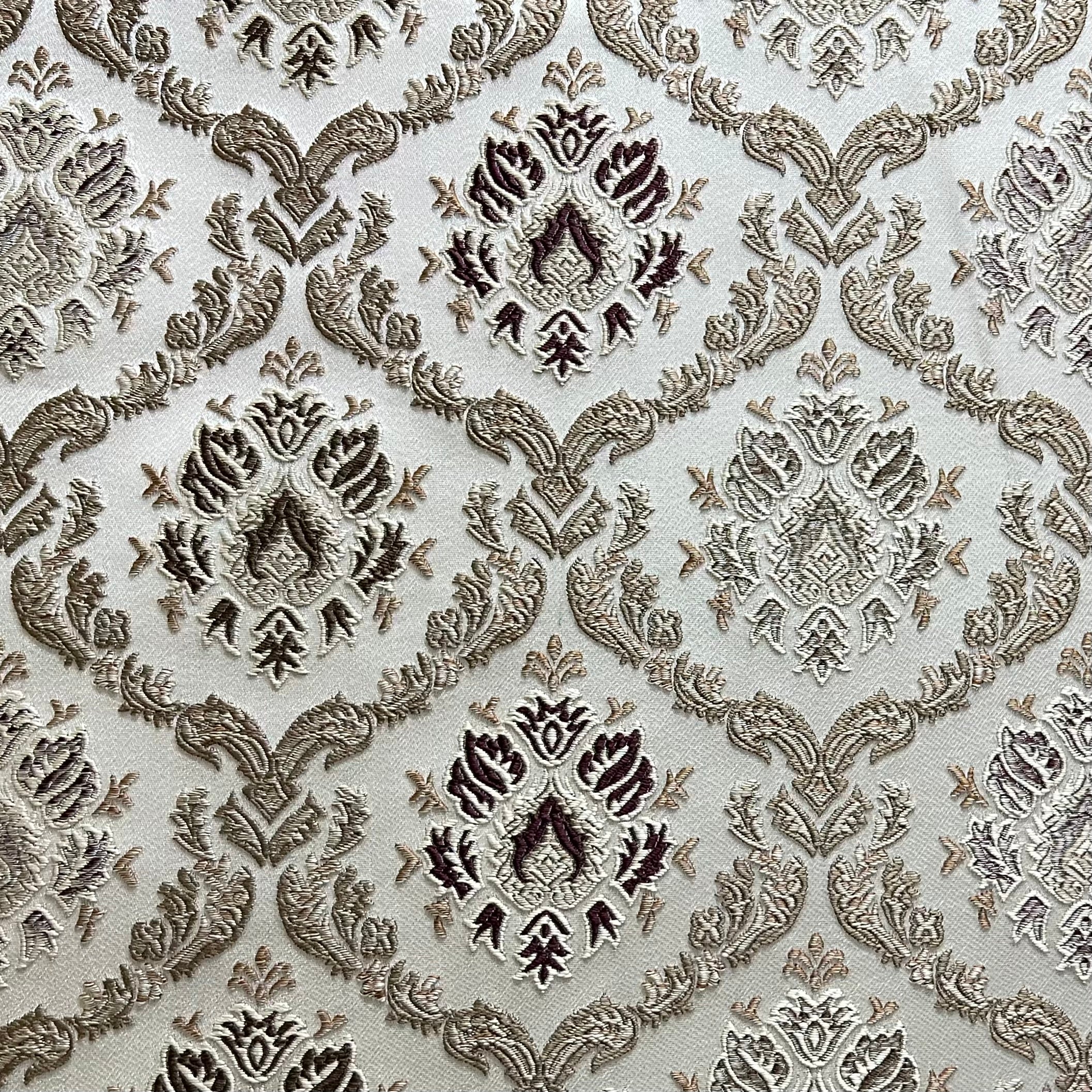 Decorative fabric with intricate Brown floral pattern on a beige background