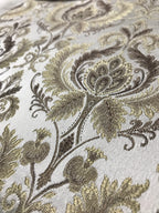 Taupe damask fabric swatch showing repeat pattern detail