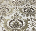 Taupe damask fabric folded, texture and sheen close-up