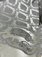 Decorative Damask Paisley pattern with intricate designs on a Scotch Mist background