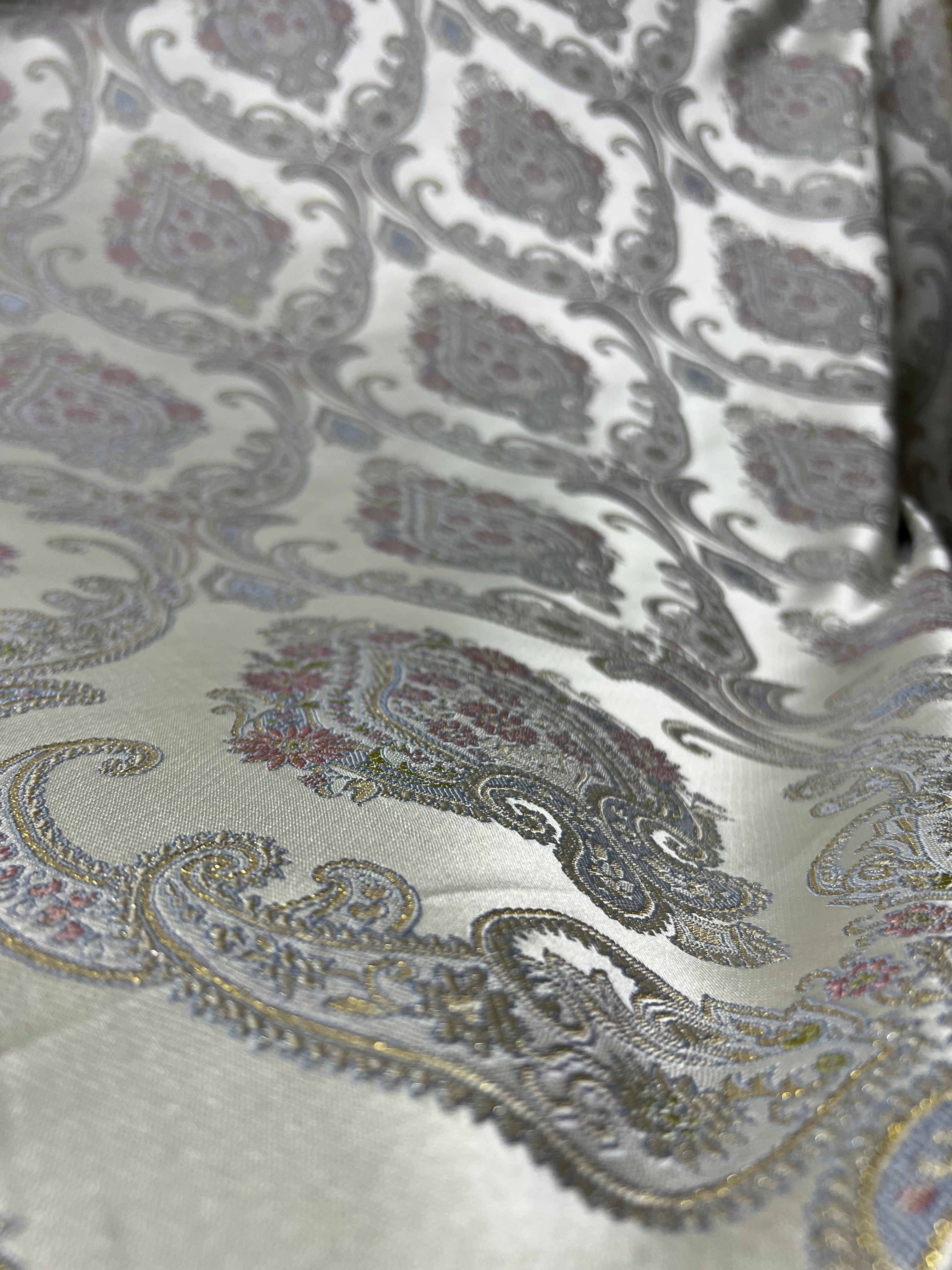 Decorative Damask Paisley pattern with intricate designs on a Scotch Mist background