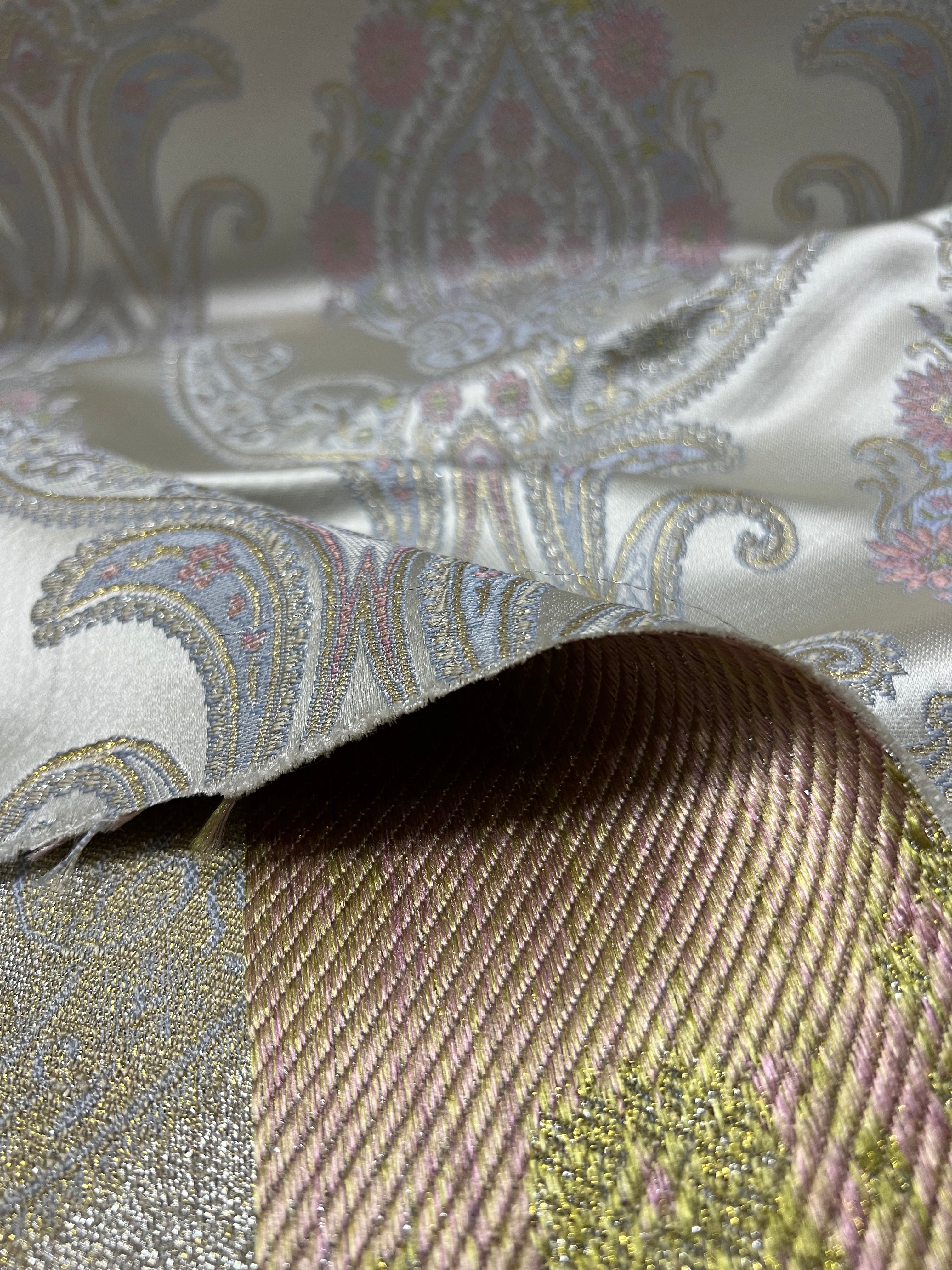 Decorative Damask Paisley pattern with intricate designs on a Scotch Mist background