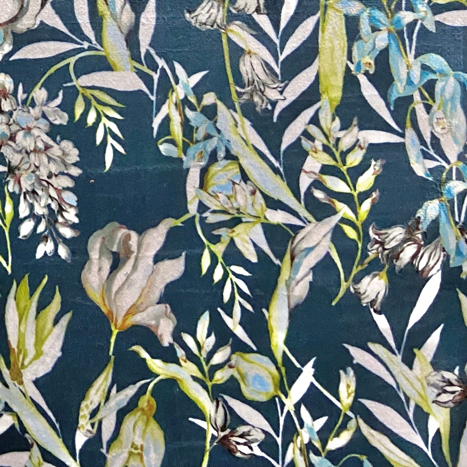Floral pattern with green leaves and white flowers on Peacock Blue background