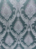 Decorative Damask Paisley pattern with intricate designs on a Teal Blue background