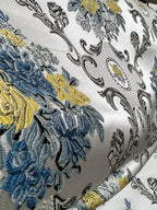 Decorative floral and damask baroque pattern with Blue and yellow flowers on a beige background
