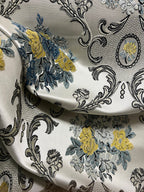 Decorative floral and damask baroque pattern with Blue and yellow flowers on a beige background
