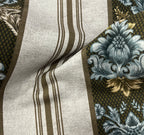 Decorative fabric with floral patterns in a striped design with Ivory Taupe  background