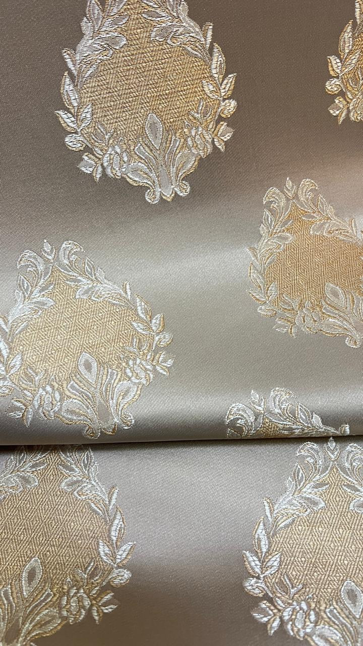 Decorative fabric pattern with intricate white designs on a Beige background