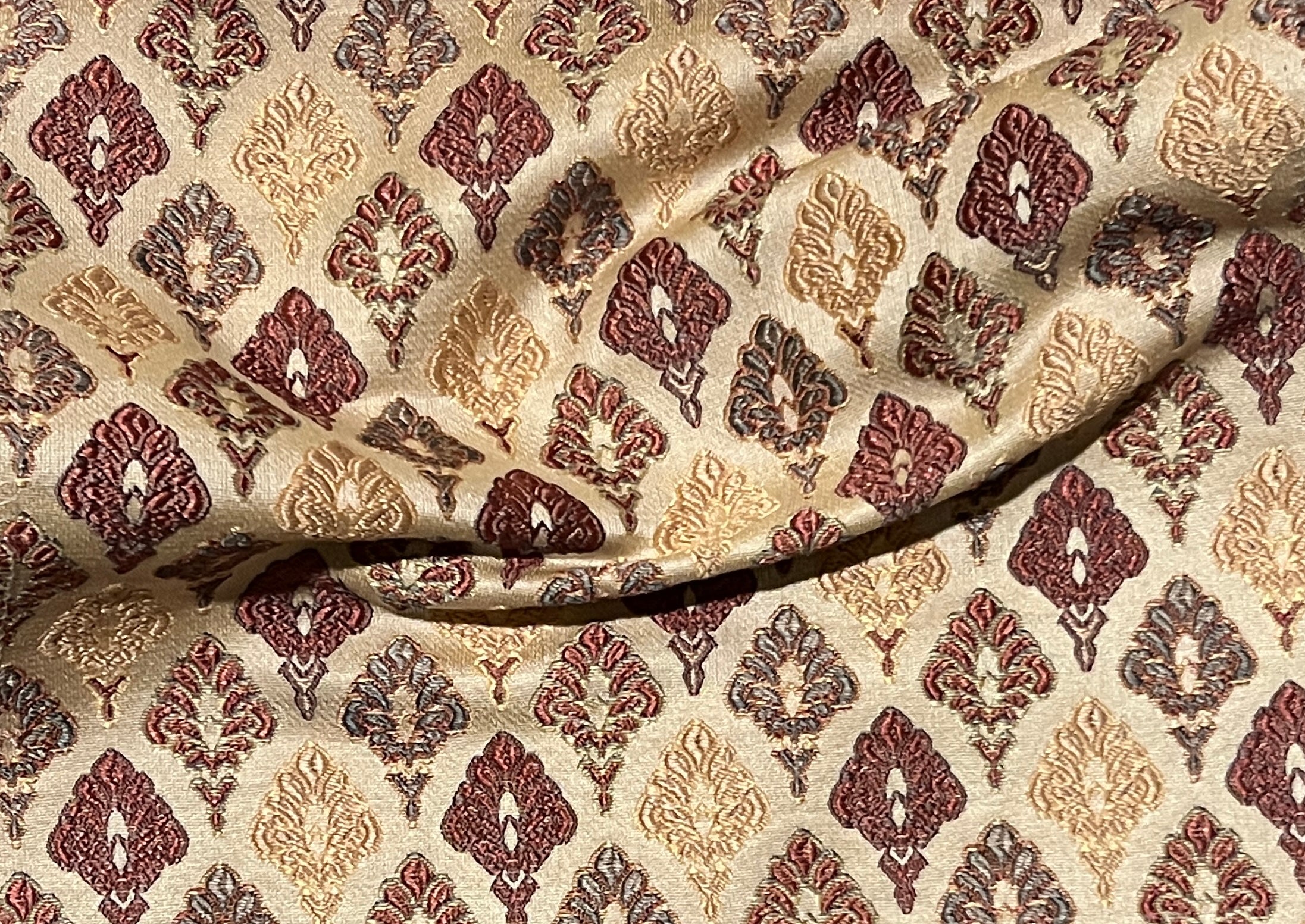 Damask Motifs representing Mughal Chandelier design in beige background with Peach design