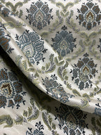 Decorative fabric with intricate Blue floral pattern on a beige background