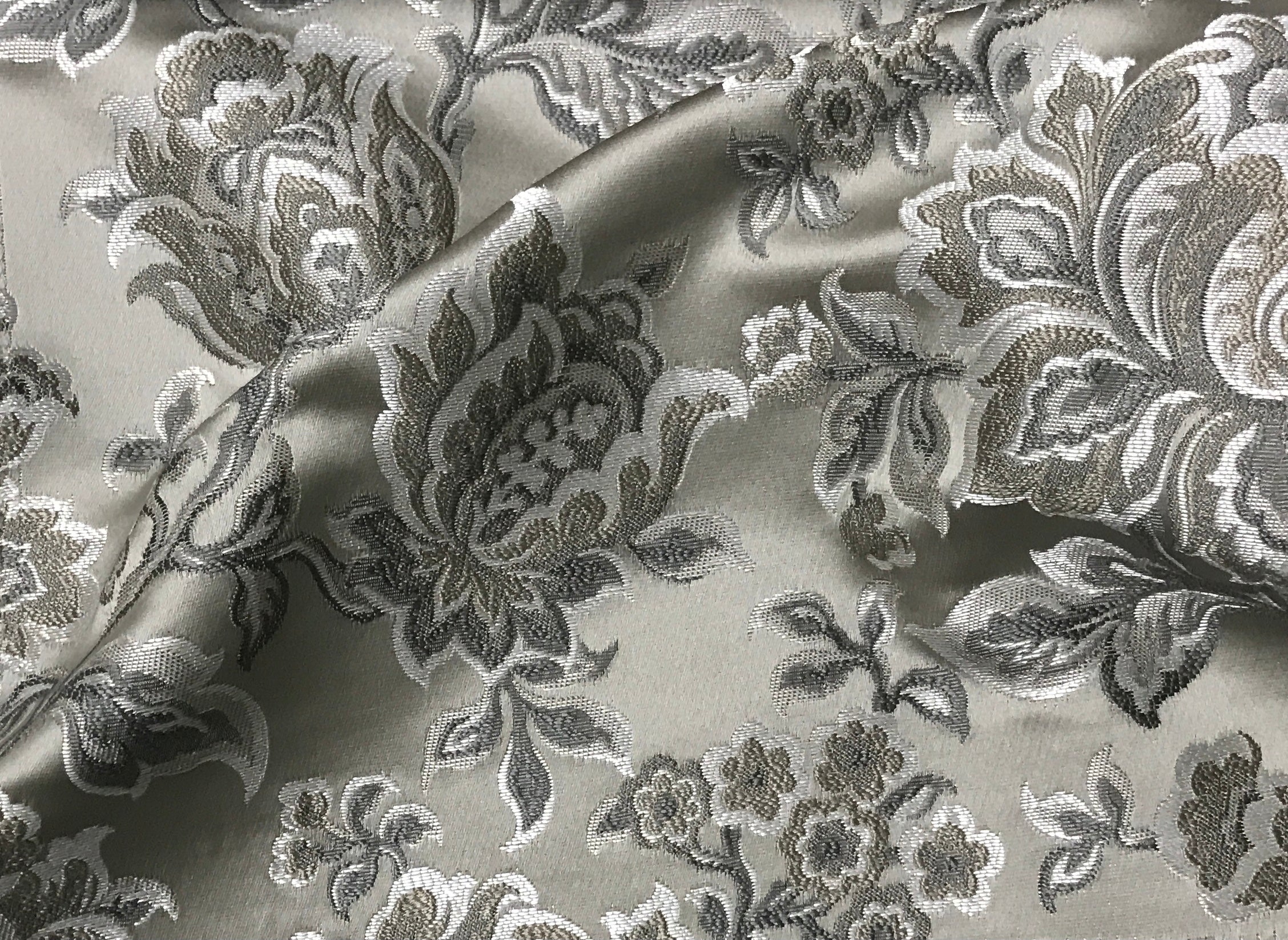 Silver floral jacquard fabric by the yard, full pattern layout view.