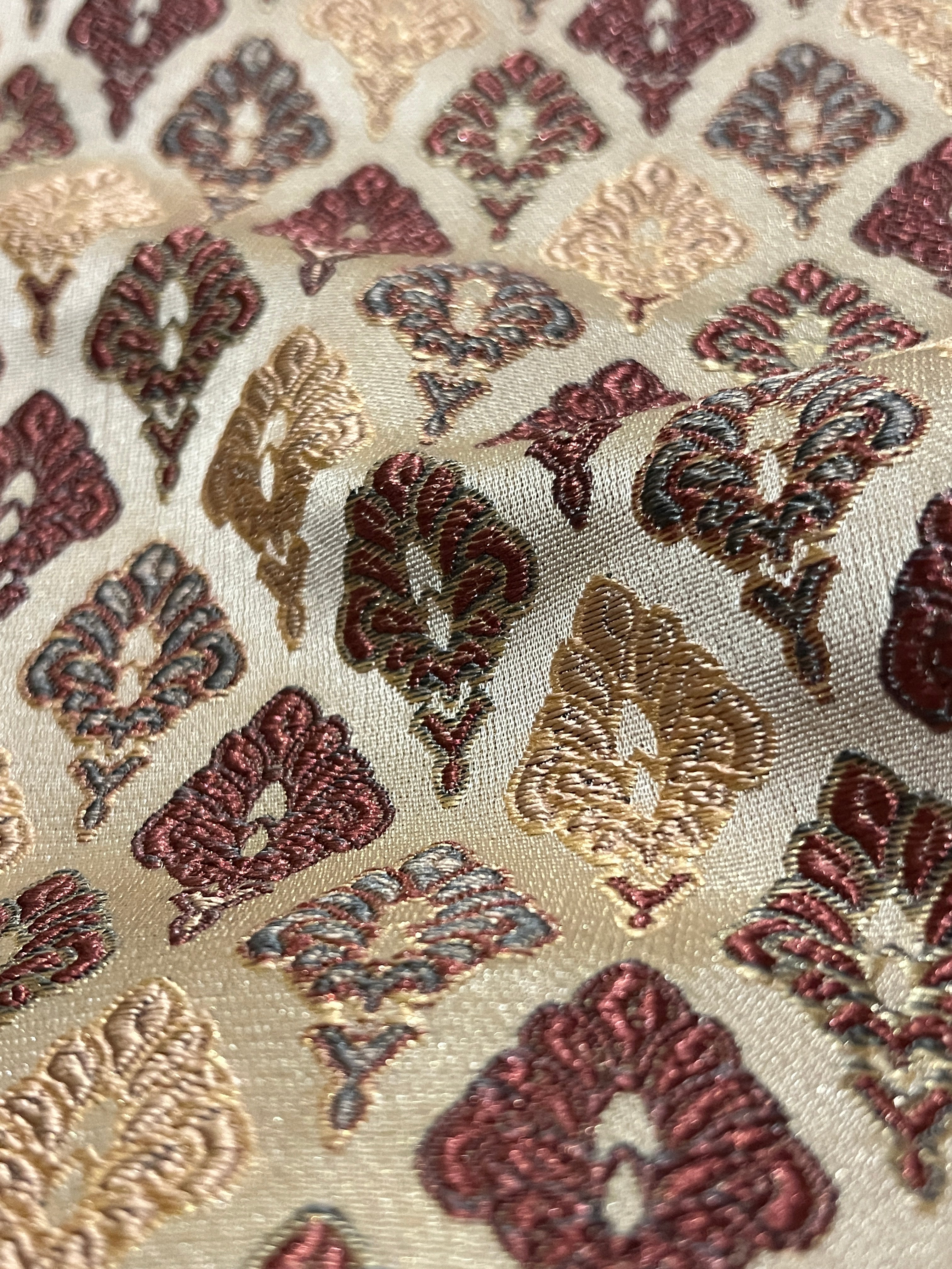 Damask Motifs representing Mughal Chandelier design in beige background with Peach design