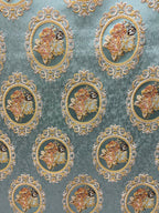 Decorative fabric with floral embroidery and intricate pattern such as Victorian Mirror Floral on an Teal Blue background