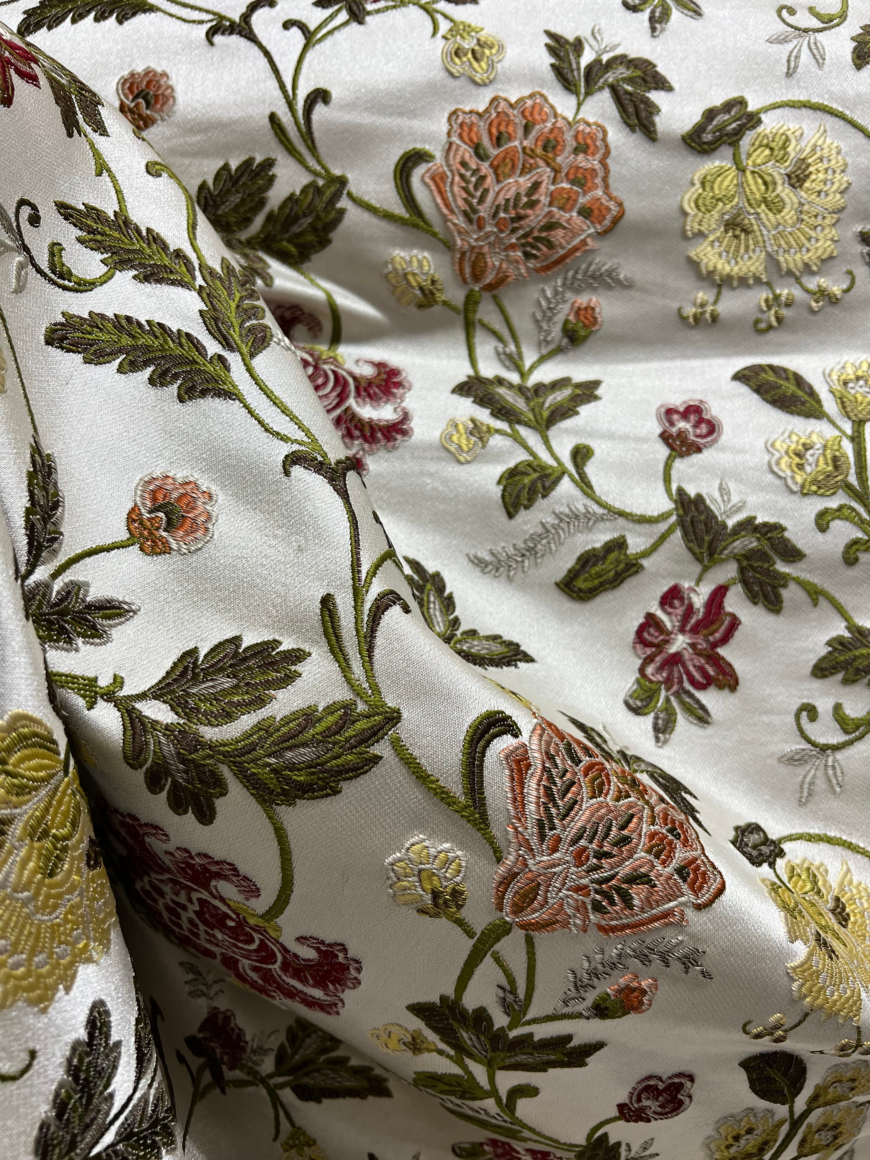 Embroidered Red floral pattern on fabric