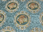 Decorative fabric with floral embroidery and intricate pattern such as Victorian Mirror Floral on an Teal Blue background