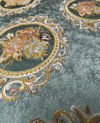 Decorative fabric with floral embroidery and intricate pattern such as Victorian Mirror Floral on an Teal Blue background