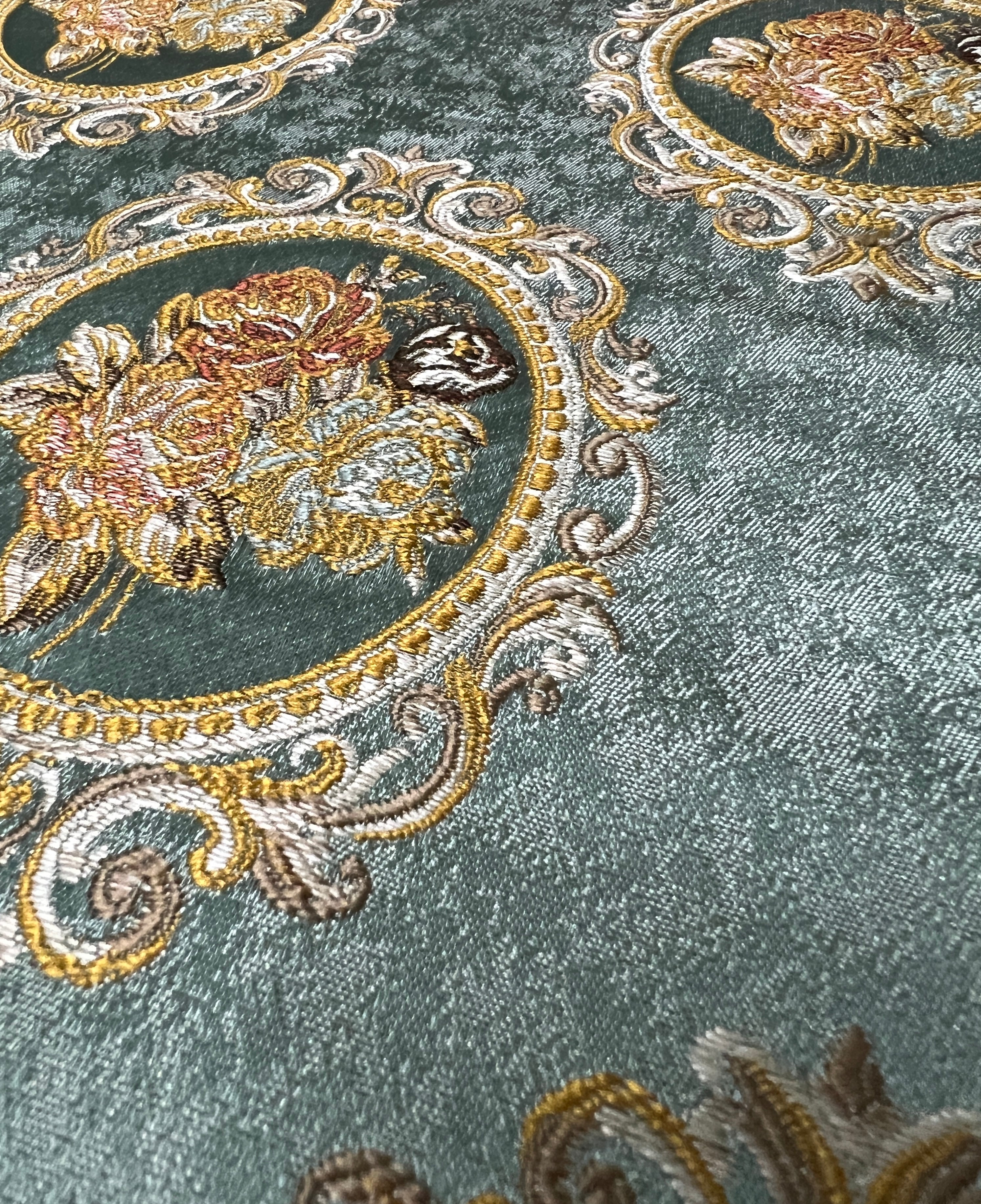 Decorative fabric with floral embroidery and intricate pattern such as Victorian Mirror Floral on an Teal Blue background