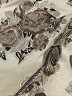 Decorative floral and baroque damask pattern on a beige background with Brown design