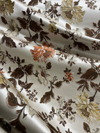 Floral pattern with Gold and brown flowers on a light background