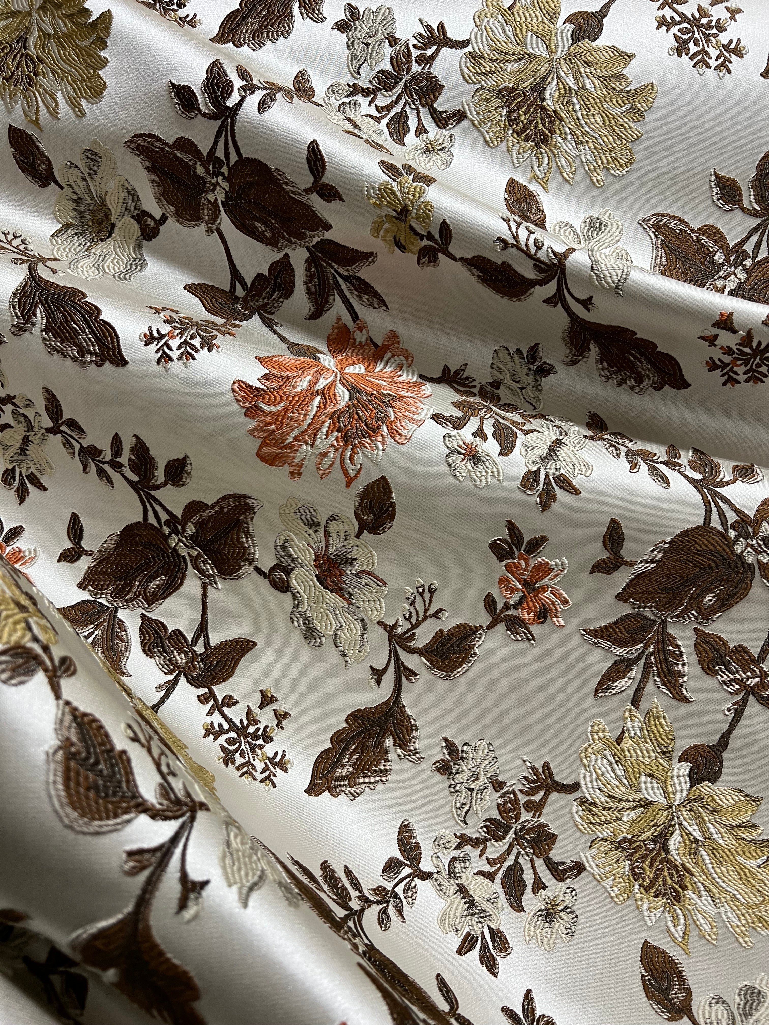 Floral pattern with Gold and brown flowers on a light background
