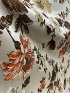 Floral pattern with Gold and brown flowers on a light background