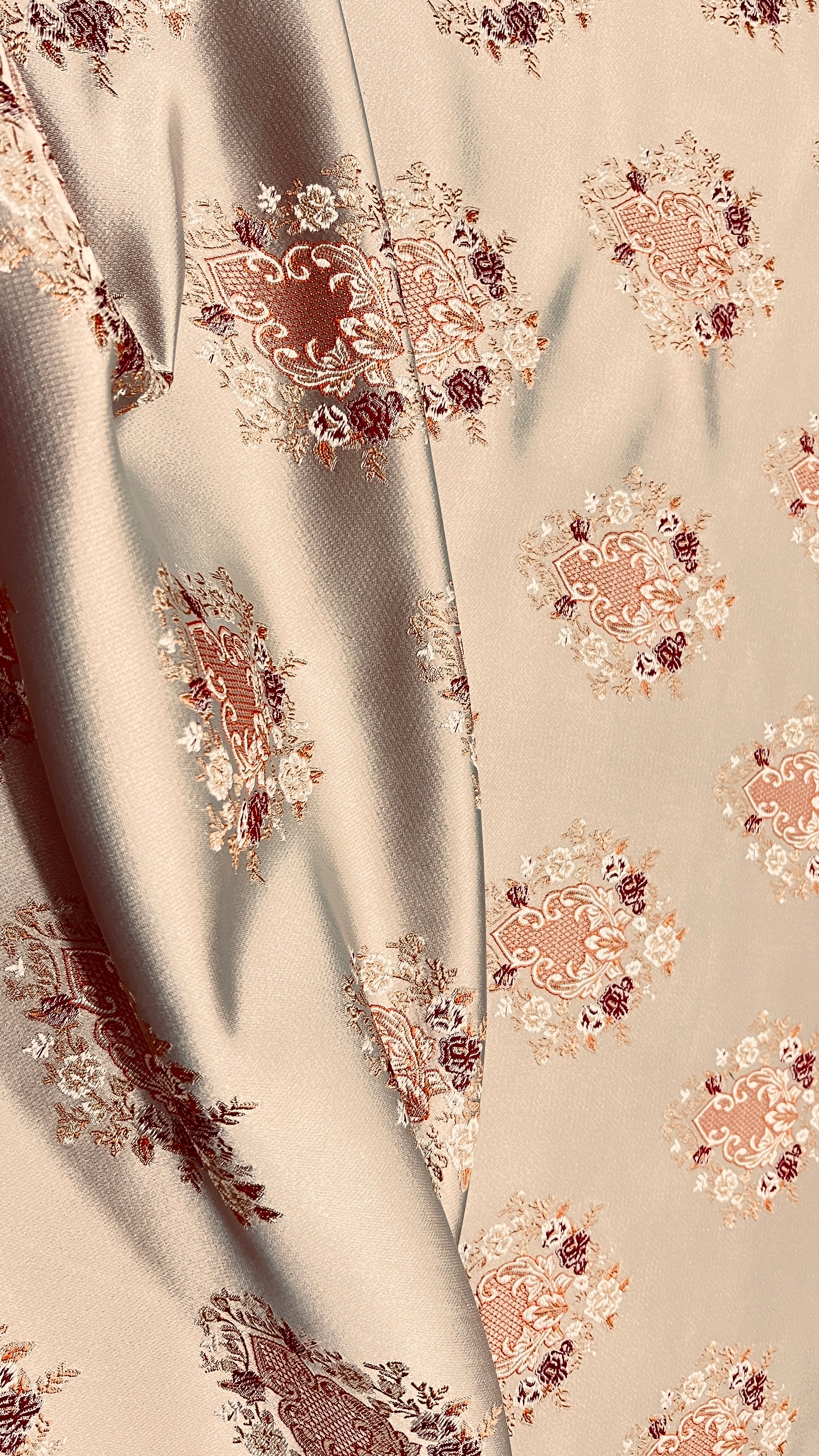 Decorative pattern with floral damask motif medallion elements on a Heavenly Pink background