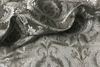 Silver damask fabric swatch showing repeat pattern detail