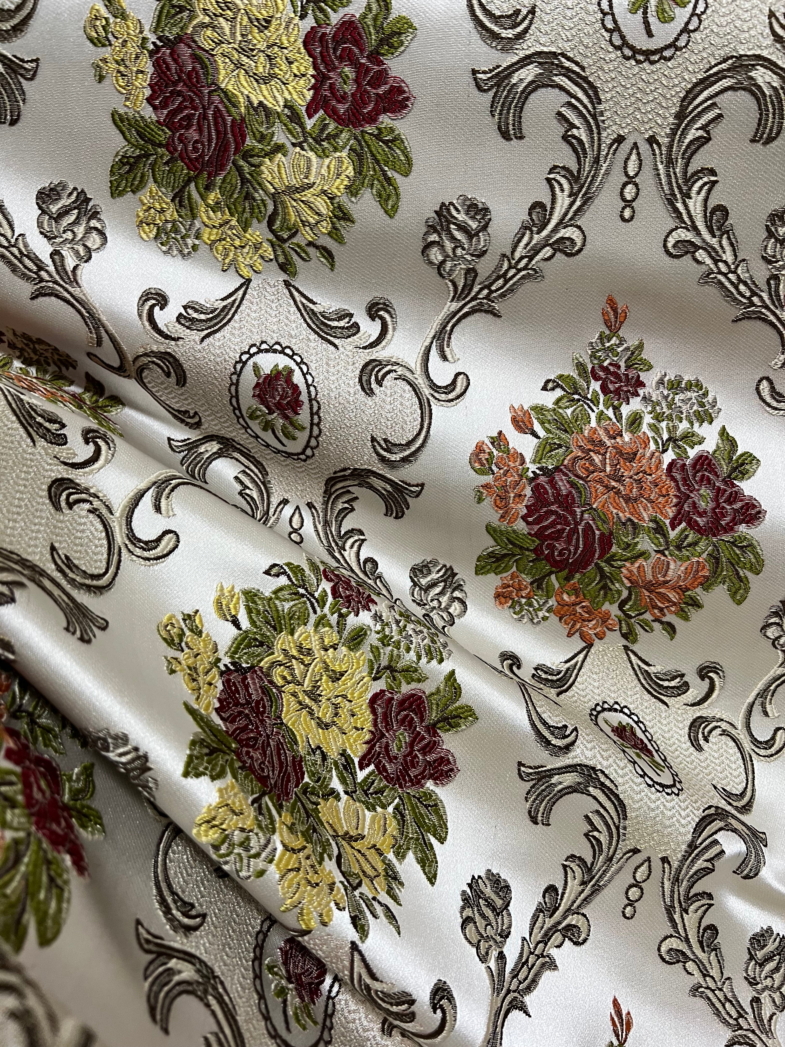 Decorative floral and damask baroque pattern with Green and yellow flowers on a beige background