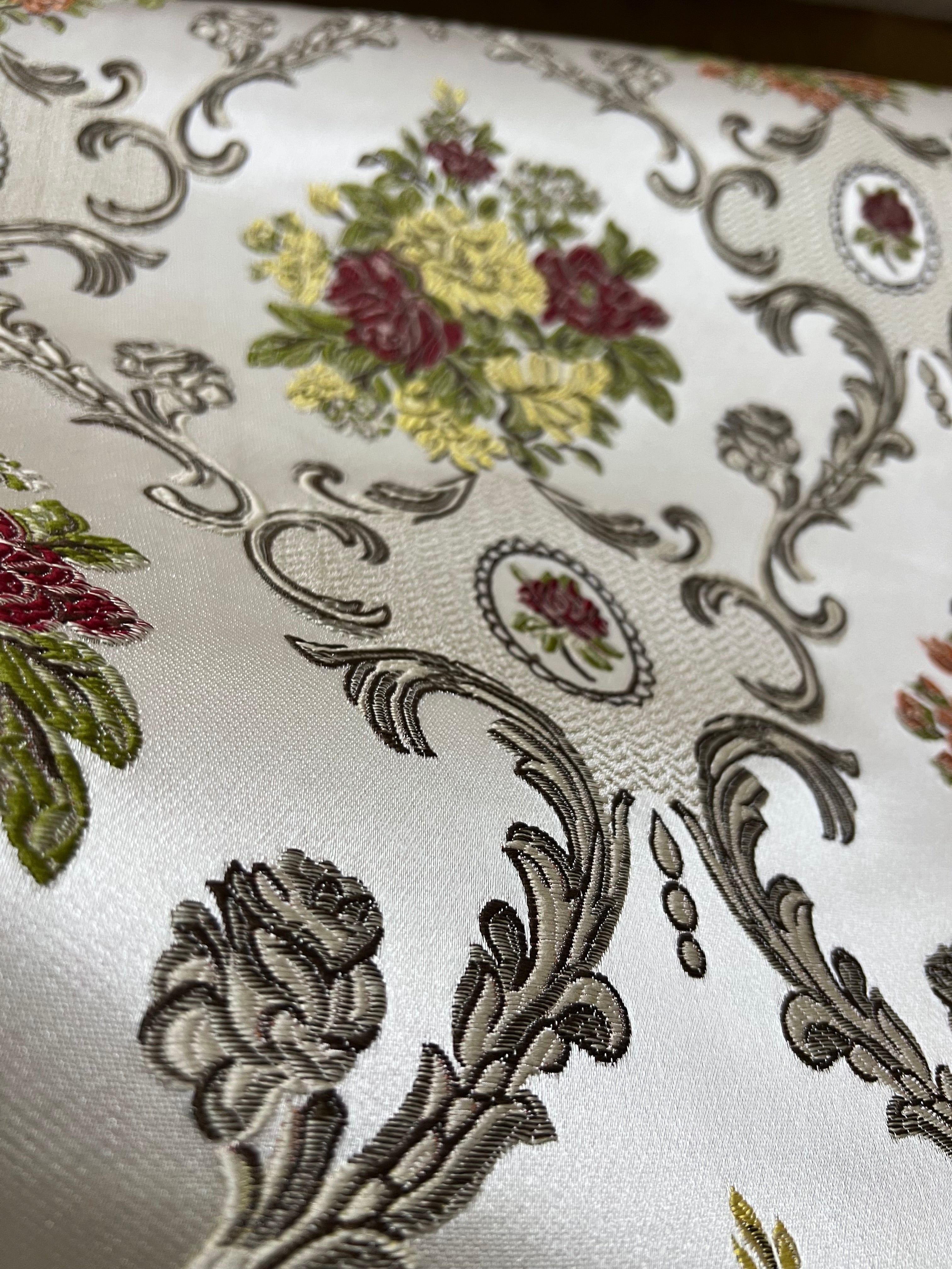 Decorative floral and damask baroque pattern with Green and yellow flowers on a beige background