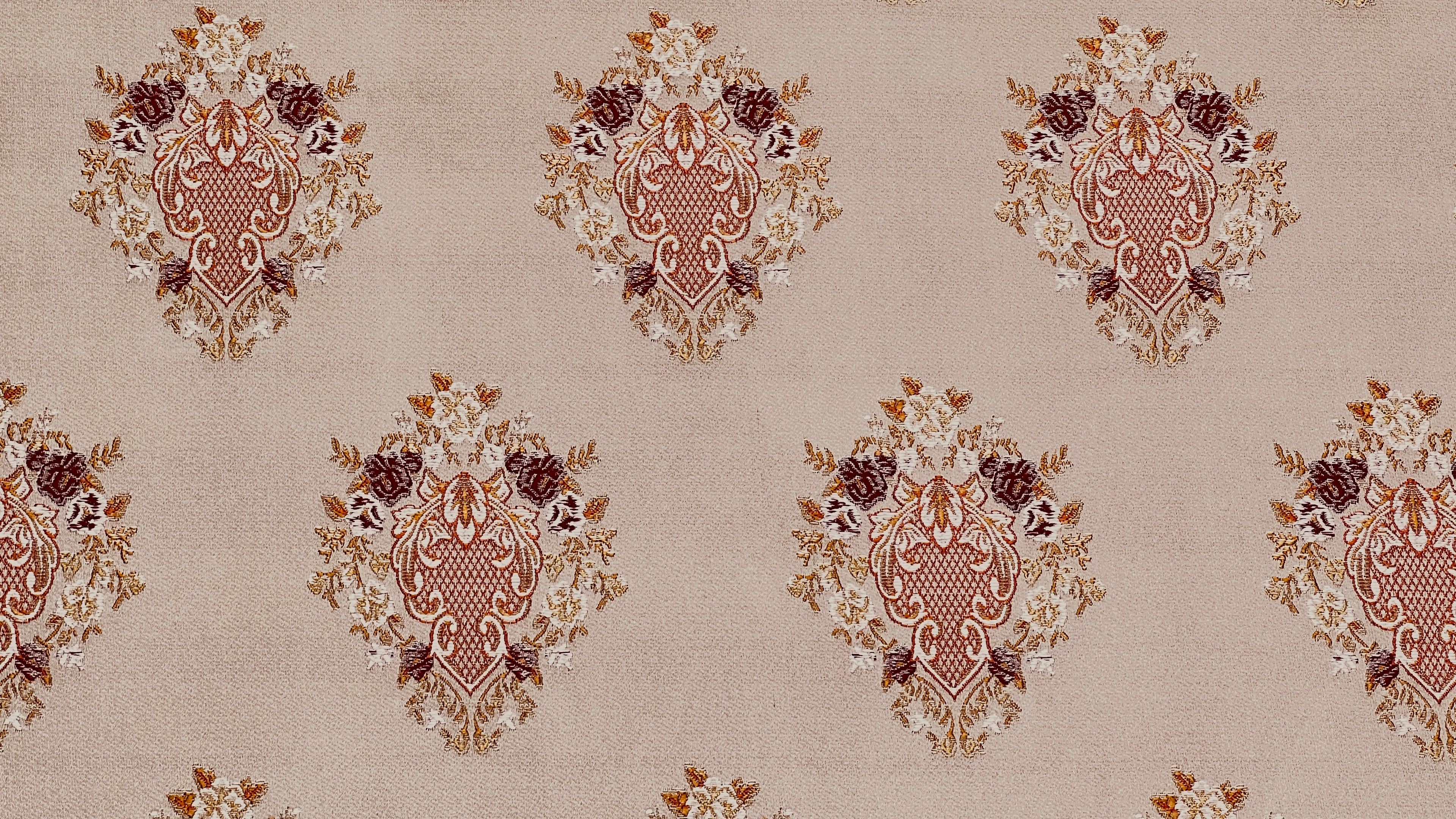 Decorative pattern with floral damask motif medallion elements on a Heavenly Pink background