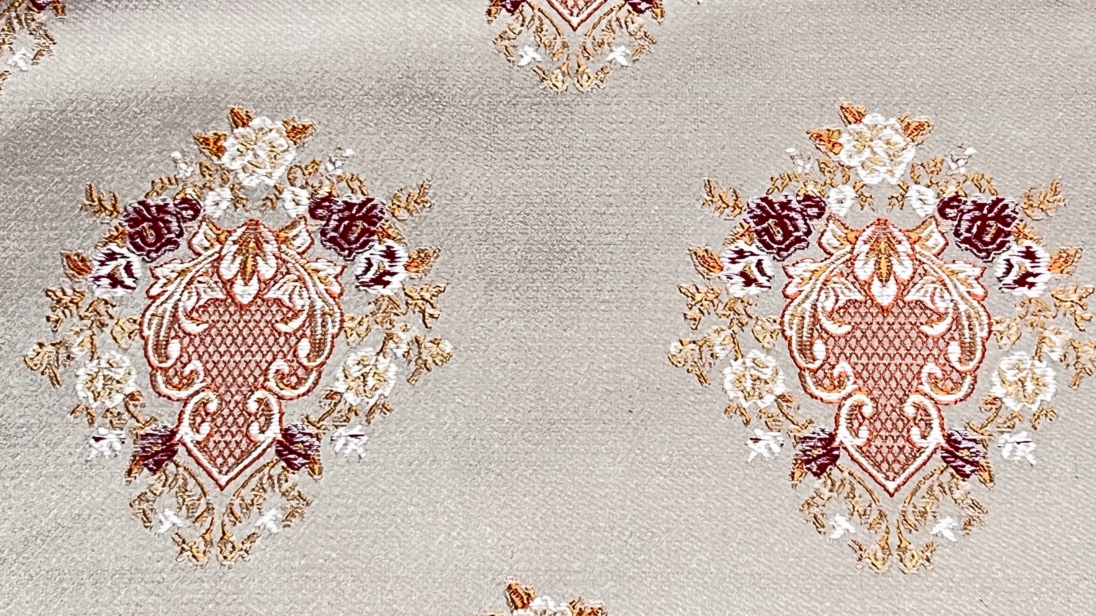 Decorative pattern with floral damask motif medallion elements on a Heavenly Pink background