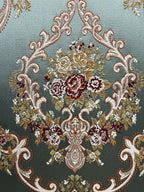 Decorative fabric with intricate floral damask on Teal Blue background
