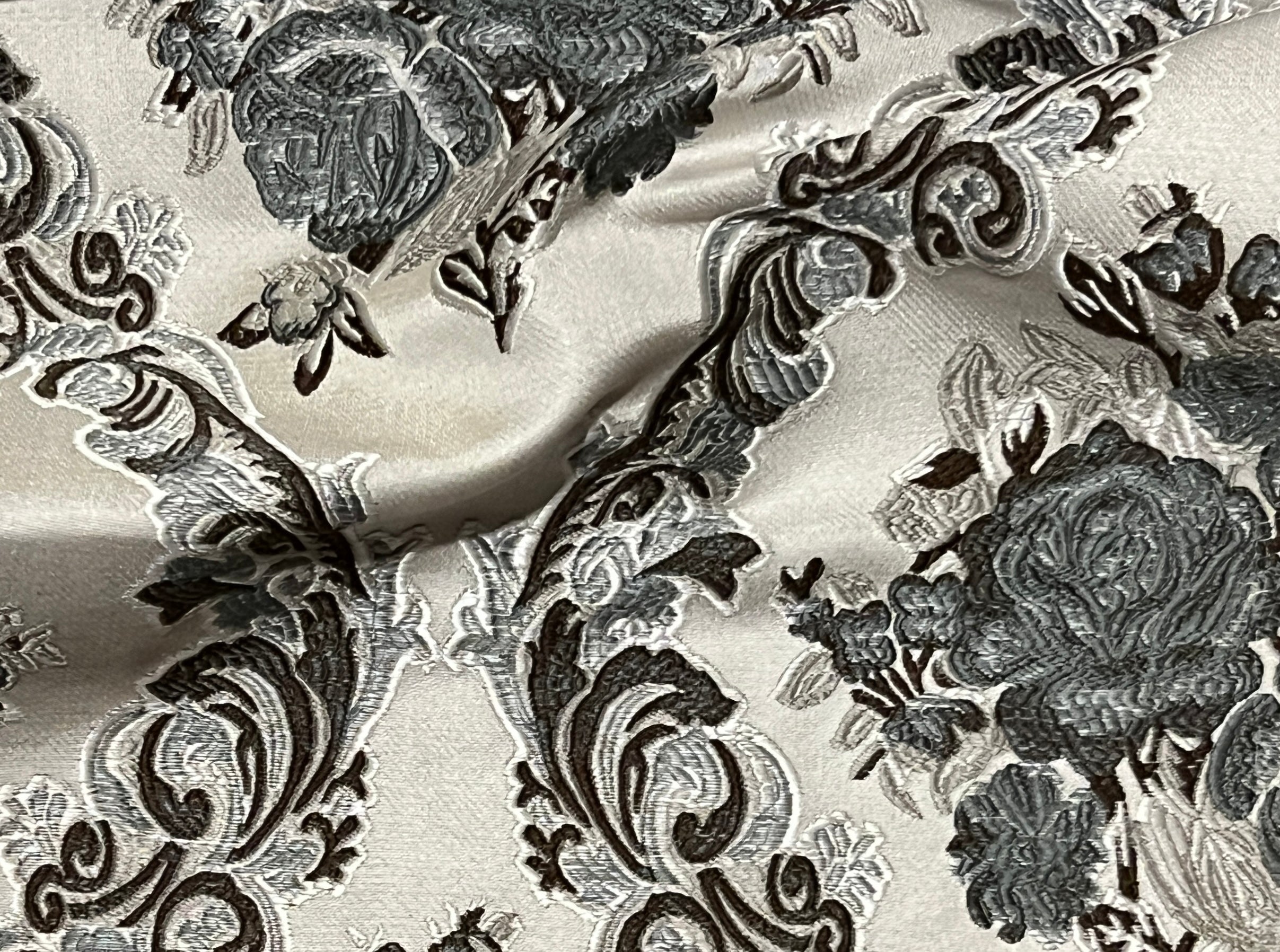 Decorative floral and baroque damask pattern on a beige background with Gray design