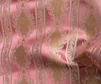 Decorative fabric with a stripe pattern on a Rosewood background