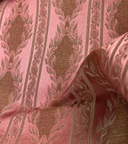 Decorative fabric with a stripe pattern on a Rosewood background