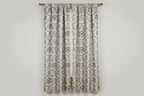 Decorative fabric with intricate Brown floral pattern on curtain panels